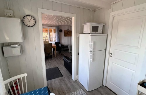 Lindesnes Casa | Holiday home 'Naversund', reduced price, off the island of Furuholmen near Lindesnes in a secluded location with a view of the fjord, Agder, southern Norway, up to 8 people, 4 bedrooms, 2 shower rooms, 2 WC, 50 m² terrace, Internet WIFI, jetty an.