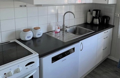 Lindesnes Casa | Holiday home 'Naversund', reduced price, off the island of Furuholmen near Lindesnes in a secluded location with a view of the fjord, Agder, southern Norway, up to 8 people, 4 bedrooms, 2 shower rooms, 2 WC, 50 m² terrace, Internet WIFI, jetty an.