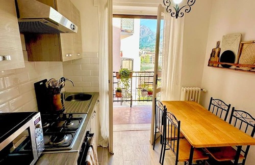 Malgrate Apartamento | Cozy rustic apartment with candlelights & mountain/lake views!