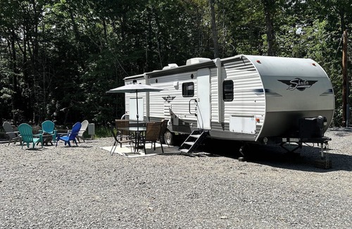 Gardiner Casa | small campground in the woods with a very unique bath house