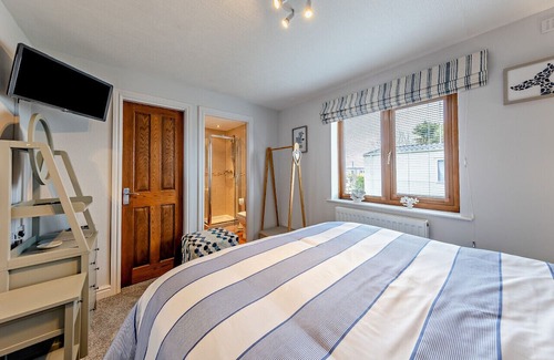 Morfa Bychan Casa | Mussel Shells Lodge - Three Bedroom House, Sleeps 6