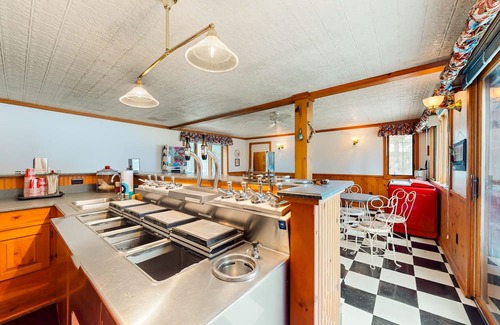 Minocqua Casa | Lakeside retreat with four bedrooms, yard, dock, balcony, & washer/dryer