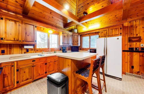 Minocqua Casa | Lakeside retreat with four bedrooms, yard, dock, balcony, & washer/dryer