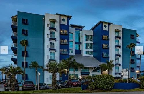 New Smyrna Beach Complejo | Coconut Palms Beach Resort II - New Smyrna beach on the beach June 7th-14th only