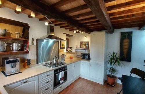 Penna San Giovanni Casa | San Isidore, a meticulously restored historic Italian home with a stunning pool.