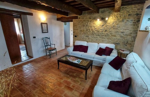 Penna San Giovanni Casa | San Isidore, a meticulously restored historic Italian home with a stunning pool.