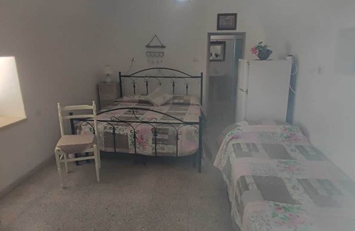 Posto Vecchio Apartamento | Apartment 'Trullo' with Private Terrace, Private Garden and Air Conditioning