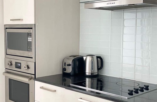 Central Waterfront Casa | Elite Urban Lodgings | Executive Escape