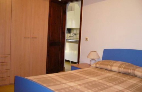 Giannella Casa | Holiday Home 'Residence Giannella - Pitosforo 46' with Private Garden and Air Conditioning