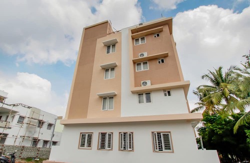 Tirupur Hotel | Capital O New Paradise Inn