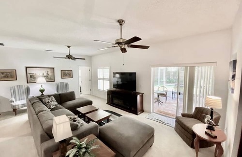 New Smyrna Beach Casa | Spacious home in Sugar Mill Country Club. Ten minutes to NS Beach & Flagler Ave.
