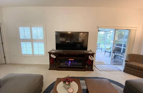 New Smyrna Beach Casa | Spacious home in Sugar Mill Country Club. Ten minutes to NS Beach & Flagler Ave.