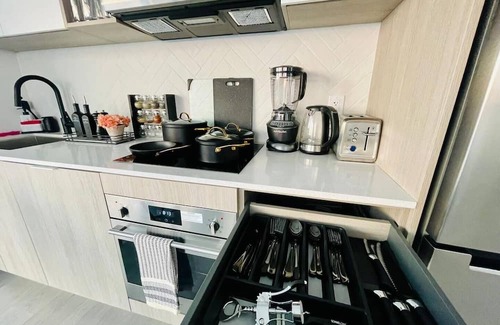 Wellington Place Apartamento | Waterfront Serene Heights