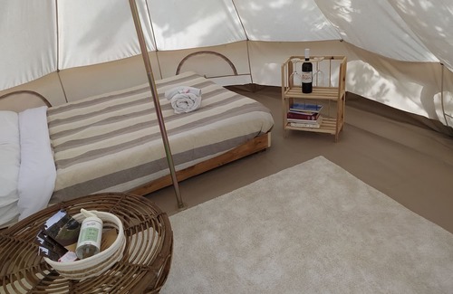 Arpino Casa | 12 m2 tent equipped with a comfortable French double bed, with an internal space to relax in. The ex