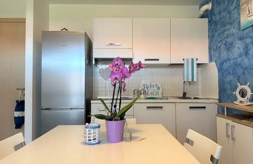 Aprilia Marittima Apartamento | Flat in a colourful residence with pool