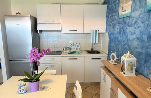 Aprilia Marittima Apartamento | Flat in a colourful residence with pool