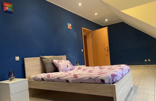 Rodange Apartamento | Family size charming duplex apartment in Luxembourg with garden and queen beds
