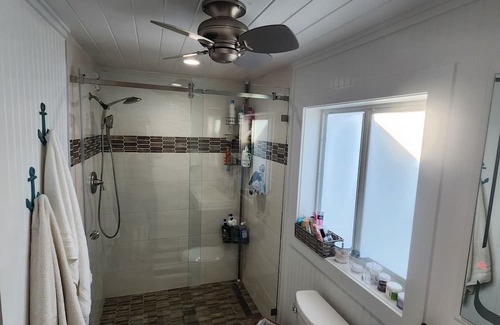 Indian River Estates Cabaña | Cozy Waterfront Cottage w/ hot tub, dock & tiki