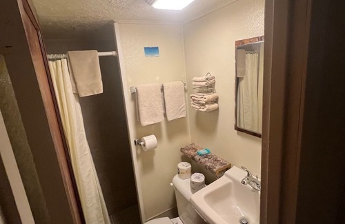 Onalaska Casa | Overlooking Lake Onalaska--Private Bedroom/Bathroom; fish cleaning room onsite
