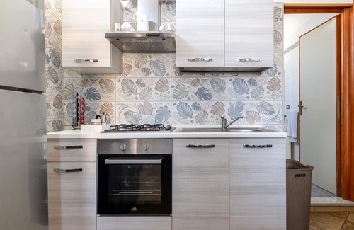Torre Ovo Apartamento | Apartment 'Casa Vacanze Le Barche Due' with Private Terrace and Air Conditioning