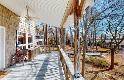Newberry Shores Casa | Unique waterfront home with direct water access, dock, firepit, porch, W/D, AC