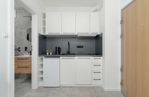 Jezyce Apartamento | Dark Grey Apartment in Poznan by Renters