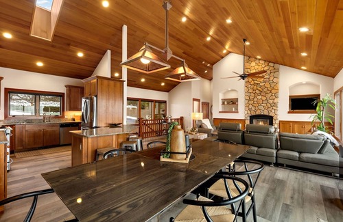 Sandpoint Casa | Waterfront home with private dock, beach, hot tub & wrap-around deck