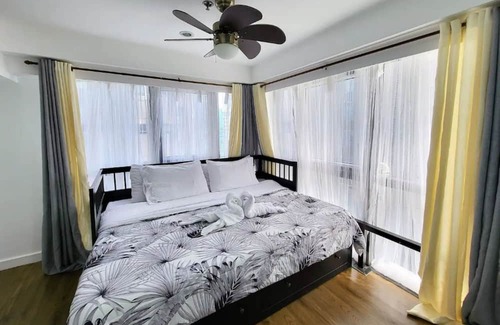 Bonifacio Global City Condominio | Muggle Stay1.0 - 2BR in BGC 50mbps WIFI