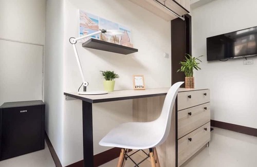 West District Apartamento | Relax Traveler Home