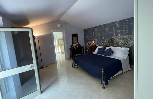 Corigliano D'Otranto Casa | Holiday Home 'Dependance Paloma' with Shared Pool, Wi-Fi and Air Conditioning