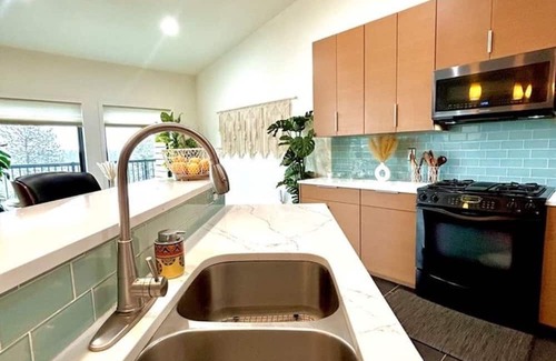 Spokane Casa | Urban Forest Boho Retreat with view