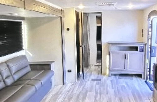 Thomson Casa | Come play with Scottish highland cows in a beautiful and cozy brand new RV!