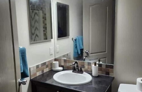 Panorama Hills Casa | Cozy 2 bed suite in calm neighborhood and dedicated parking