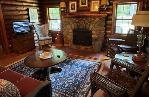 Nevis Cabina | Booking now for summer! Stunning vintage log home on pristine lake.