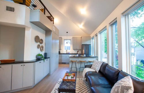 North Loop Casa | Stylish 3 story house. 3 patios. Central Austin.