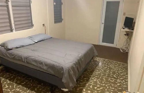 Mayaguez Pueblo Casa | Nice House near University of Mayaguez with covered and gated car parking.