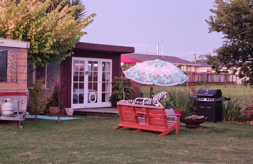 Westport Cabaña | Unique, delightful Tiny Home with Alfresco living area including retro Poptop.