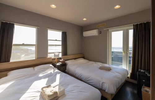 Sumoto Casa | Panoramic view of the ocean with a sunset view En / Sumoto Hyōgo