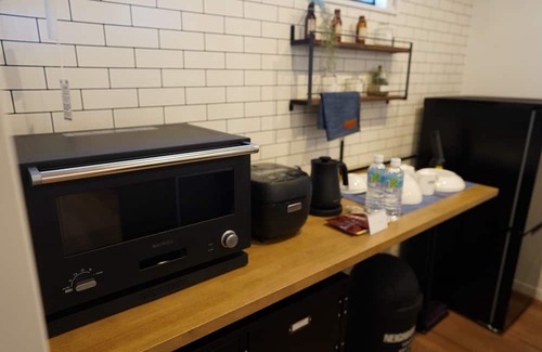 Saeki Ward Casa | Limited time offer today Sameday discount price - Garage House Hotel ISHIUCHI BASE 02 / Hiroshima Hiroshima