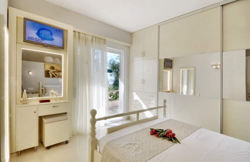 Perama Casa | Homerez - Nice house 500 m away from the beach for 4 ppl. with garden at Corfu