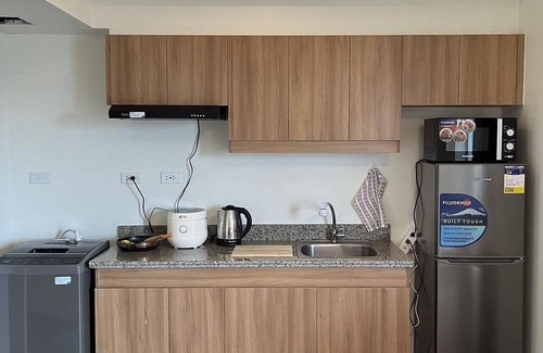 Pasig Condominio | City & River View Retreat: Ideal for Meditation