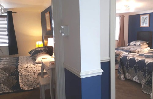 Douglas Casa | Bed and Blueberry, Two Bedroom Suite