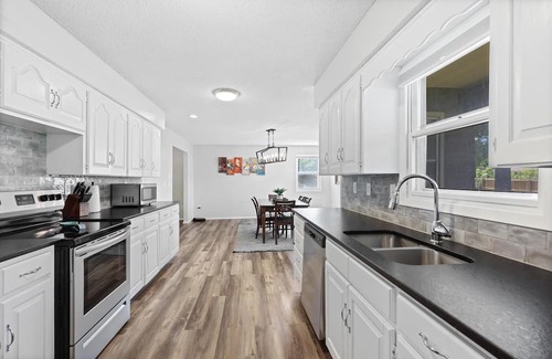 Joplin Casa | Stylish Rancher in Quiet, Tree Lined Neighborhood.