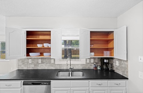 Joplin Casa | Stylish Rancher in Quiet, Tree Lined Neighborhood.