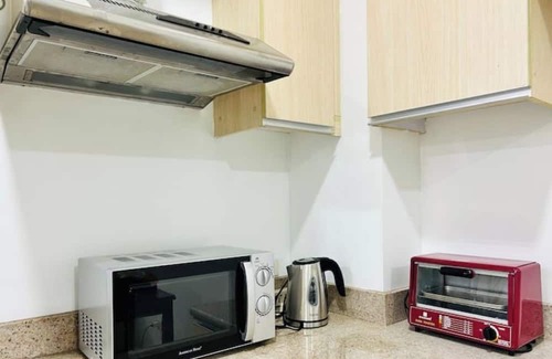 Kapitolyo Apartamento | Ace Suites by the WaterSpa - Twin 1BR Family Room