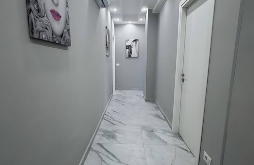 Monte Po-Nesima-San Leone-Rapisardi Apartamento | Room 'Dolce Relax - Tripla Luxury' with Wi-Fi and Air Conditioning
