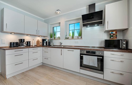 Wischhafen Apartamento | Apartment 'Haus Ankerplatz' with Private Terrace, Shared Garden and Wi-Fi