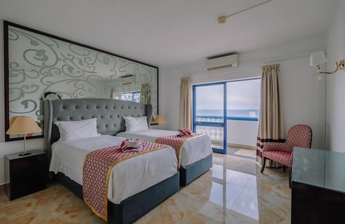 Oura Hotel | Beachfront 5-Star Hotel with Indoor & Outdoor Pool! 3 Spacious Units w/Kitchens