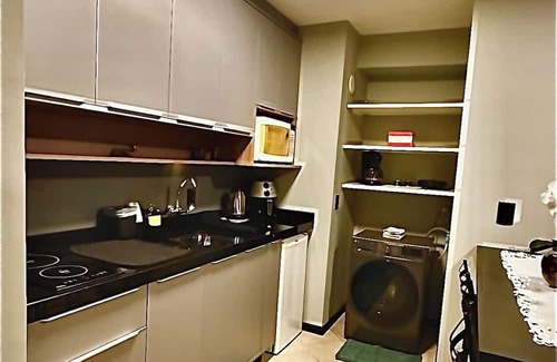 Czerniewicz Apartamento | The loft is centrally located, has a hot tub, a privileged view, a swimming pool, and a gym.