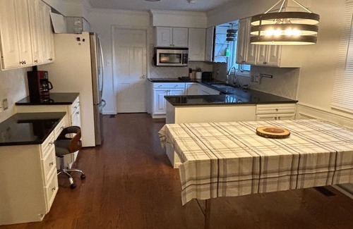 Hutchinson Casa | Spacious 5-bedroom Retreat with Pool and Tennis Court In Beautiful Neighborhood
